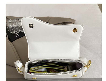 Luna curve textured shoulder bag